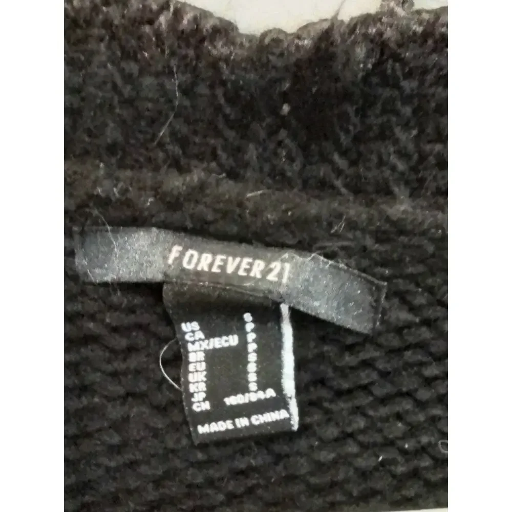 Forever 21 black sweater with red mushrooms.